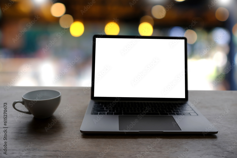 Aufkleber advertise media branding with a blank white desktop screen to a mockup of a man using and typing on 