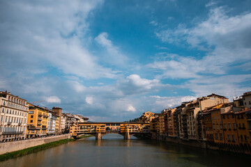 Fototapeta na wymiar Ponte Vecchio Bridge Under Blue Sky, Florence Italy