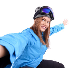 Beautiful woman in ski goggles taking selfie on white background