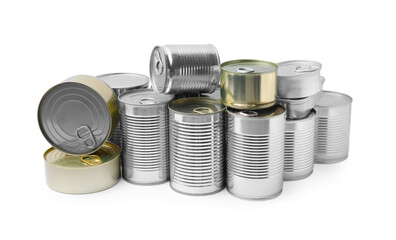 Many closed tin cans isolated on white