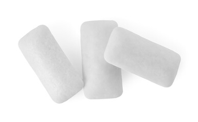 Tasty chewing gums on white background, top view