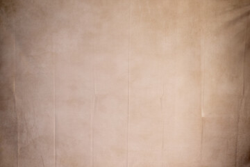 Hanging fabric with beige texture and vignette. Cloth photography background.
texture for portraits