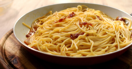 Spaghetti carbonara. Pasta with pancetta, egg, parmesan cheese. Traditional italian cuisine. Pasta alla carbonara.