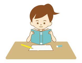 宿題のために本を読む女の子