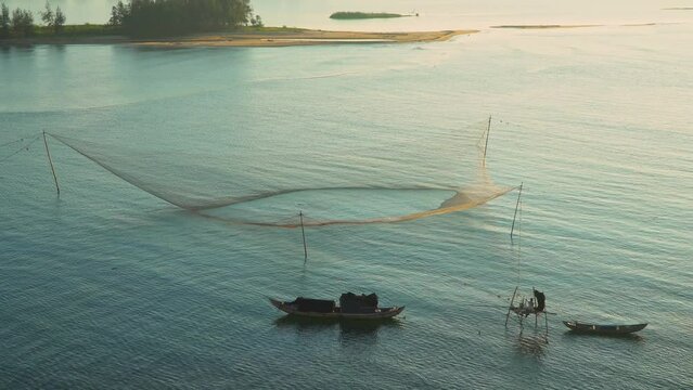 Giant fish rackets (Ro Gian) of Vietnamese fishermen at the mouth of Tra Khuc river, Quang Ngai. Those are the last ones in this place, when fishermen no longer do this profession.