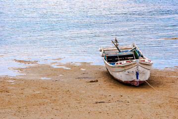 Naklejka premium boat on the beach