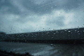 Rain drops on the window windshield. Raindrops on the windshield.