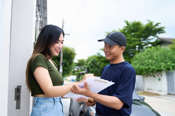 Woman receiving parcel from delivery man at the door. satisfied happy customer with online store order, good shipping delivery service