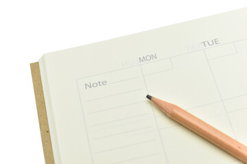 top view image of open planner notebook with blunt wood pencil isolated on white background