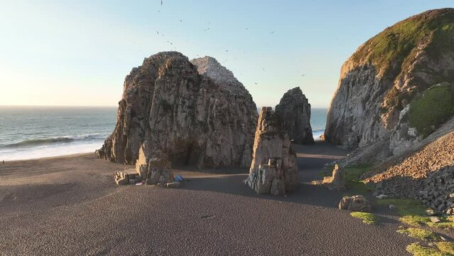 Large rocks natural monument Piedra de Iglecia Church stone on Chilean coast in Constitucion in sunset