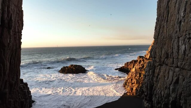 Large rocks natural monument Piedra de Iglecia Church stone on Chilean coast in Constitucion in sunset