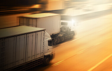 Speed Motion of The Trucks Driving on The Road. Commercial Truck, Express Delivery Transit. Shipping Container Truck Transport. Freight Trucks Logistic, Cargo Transport.