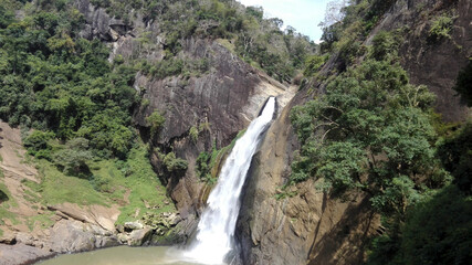 Fototapeta na wymiar Dunhinda Falls is a waterfall located about 5 kilometers (3.1 mi) from Badulla in the lower central hills of Sri Lanka.. Height - 64 meters.