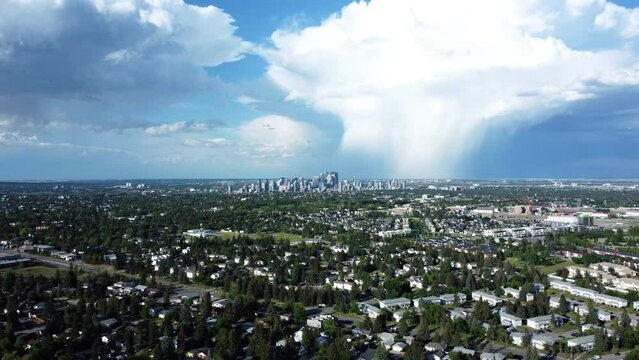 Rain clouds over downtown Calgary from an aerial perspective in summertime