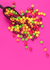 Different colored round candy.