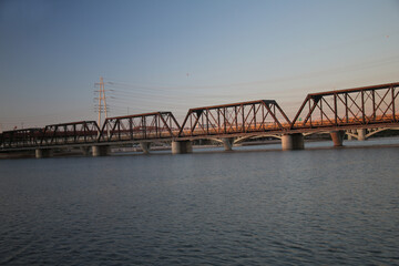 Fototapeta na wymiar Railroad Bridge over the river