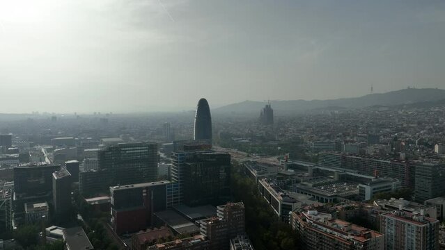 sunny smog barcelona city famous buildings traffic street aerial panorama 4k spain