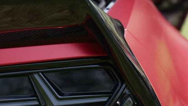 Carbon Fiber Taillight Of A Red Chevrolet Corvette Car. macro ascend