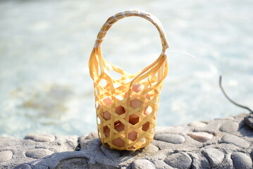A bamboo basket filled with raw chicken eggs to boil in hot spring water. San Kamphaeng District Chiang Mai Province Thailand