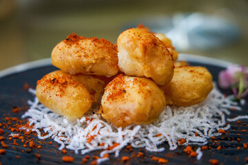 A plate of crispy and delicious fried shrimp balls