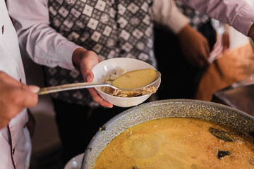 Waiters serving the food for consument