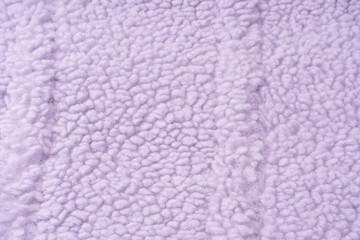 Purple fur texture as a background.