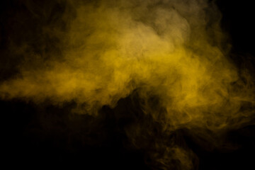 Yellow steam on a black background.