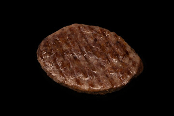 Cutlet with minced beef isolated on  black background.