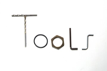 Tools. Lettering with tools on a white background. Construction and repair.