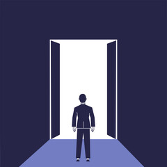 Businessman stands in front of open doors. Concept of decision making, new beginning.