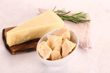 Chopped Italian hard parmesan cheese