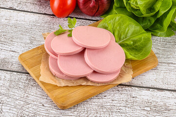 Slices boiled sausages for breakfast