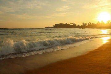 View of a tropical beach near to Unawatuna, Sri Lanka.