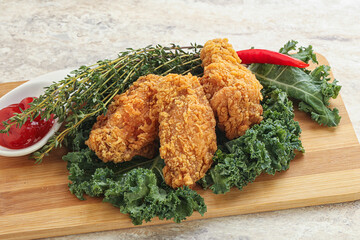 Crispy chicken wings with tomato ketchup