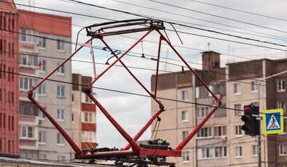 Metal wires on the roof of the tram