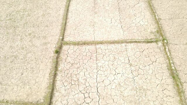 Aerial view of parched farmlands as harsh drought continues. Overhead shot