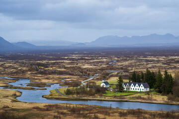 Thingvellir national park in iceland in early summer, areal view with Pinkvallkirkja and the canyon