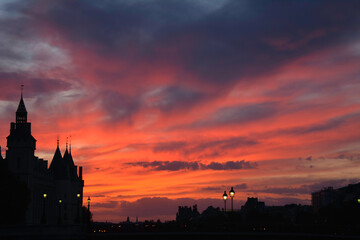 Fototapeta na wymiar Scarlet Sunset by the Conciergerie, Paris