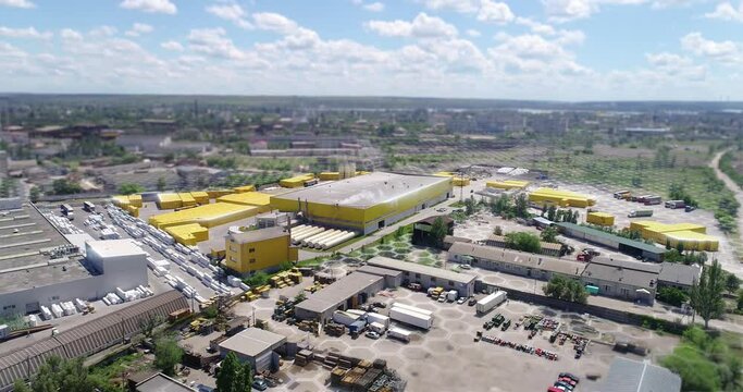 Concept of a modern factory, drone view. Flight over the modern factory. Modern factory aerial view. Digitalization of production