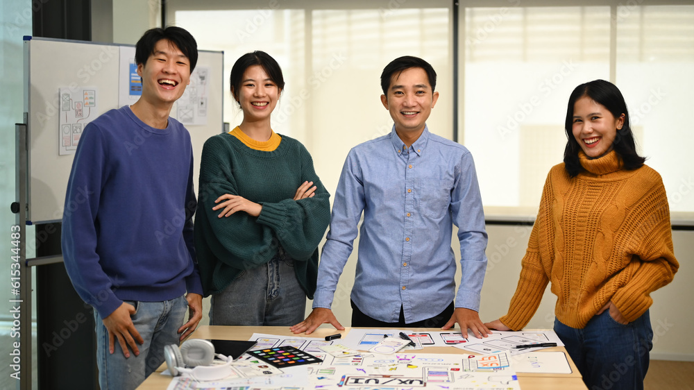 Aufkleber image of professional developer team standing at co working space and smiling confidently to camera