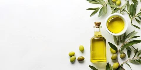 Foto op Plexiglas Healthy lifestyle. Fresh organic olive oil. Bottle on branch with white background copy space © Thares2020