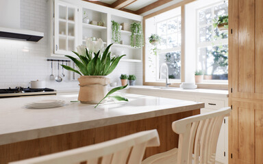 The interior of a large U-shaped kitchen with a wooden front and a large island