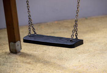 plastic swing on a chain