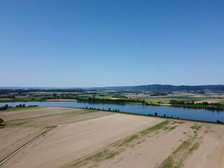Danube river with dried up fields near Donau and the lock in Geisling,