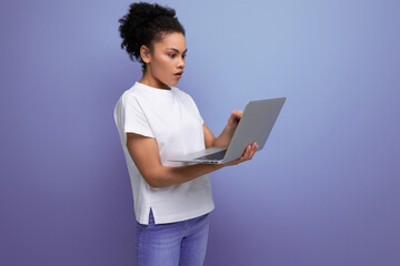 young smart hispanic business woman in white t-shirt got working remotely with laptop. business concept