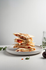 quesadilla with cheese and beans on a light background