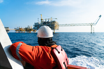 Obraz premium Offshore oil and gas wellhead remote platform which produced raw material for sent to onshore refinery, power generation and petrochemical industry.