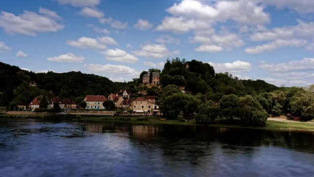 Timelapse of the beautiful village of Limeuil above the Dordogne river. With beautiful clouds on one that announce a storm, Dordogne, France