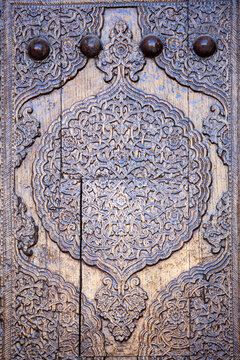 wooden decoration in the door