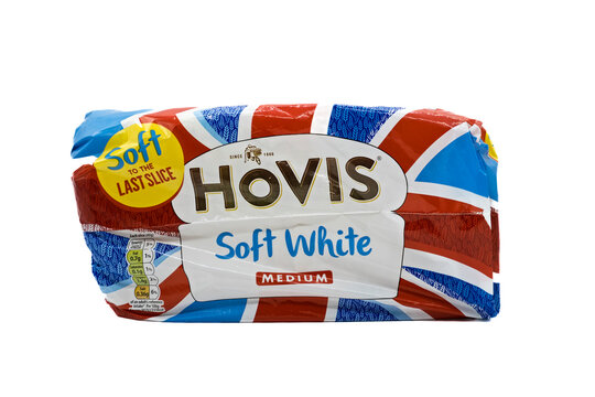  Hovis branded Soft White Medium Loaf of Bread in a plastic bag that is recyclable in most UK supermarkets and displaying graphics and icons with Kcal information relevant to the bread product.